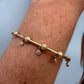 DRIP JEWELRY BRACELETS Criss Cross Bead on Gold Cuff with 5 tiny sparkles / Thin Gold Cuff Slider Bead Cuffs with Sparkles (14k gold-filled)